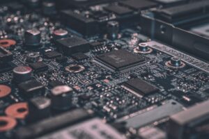 Embedded systems development — production PCB with microchips and surface-mount components